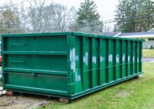 homeguide brand new 30 yard dumpster rental for landscaping and tree removal project